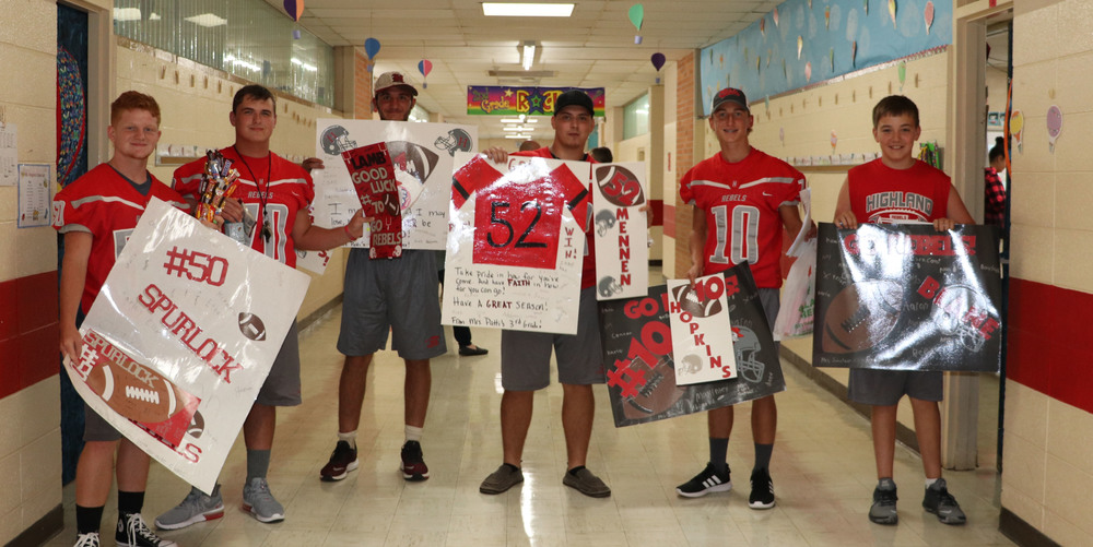 Elementary classes adopt a football player